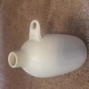 Minimalist White Ceramic Vase That Hangs On Wall